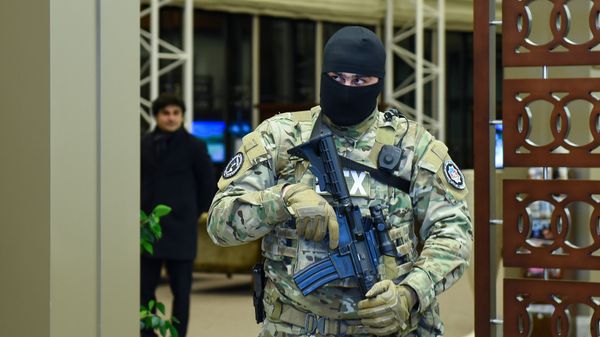 Сотрудник Службы государственной безопасности Азербайджана, фото из архива Сотрудник Службы государственной безопасности Азербайджана, фото из архива - Sputnik Азербайджан