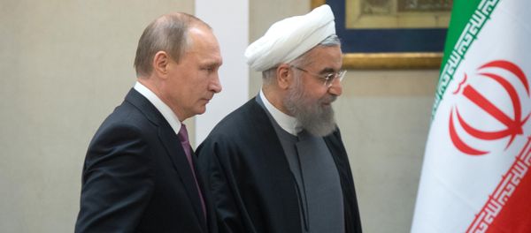 Президент России Владимир Путин (слева) и президент Исламской Республики Иран Хасан Роухани, архивное фото - Sputnik Азербайджан