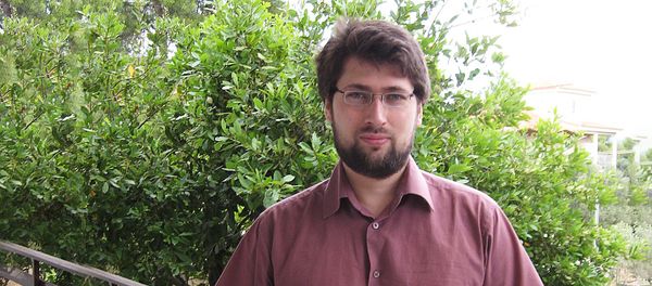 Руководитель Центра экономических исследований Института глобализации и социальных движений Василий Колташов - Sputnik Азербайджан
