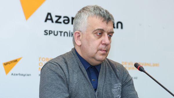 Российский политолог Олег Кузнецов - Sputnik Азербайджан