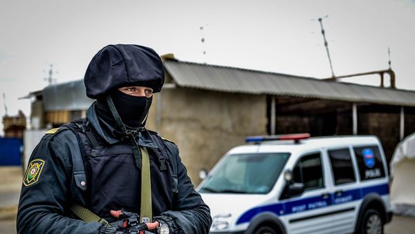 Полицейский в Нардаране, фото из архива - Sputnik Азербайджан