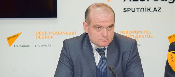Профессор Государственного экономического университета Азербайджана Эльшад Мамедов Профессор Государственного экономического университета Азербайджана Эльшад Мамедов - Sputnik Азербайджан