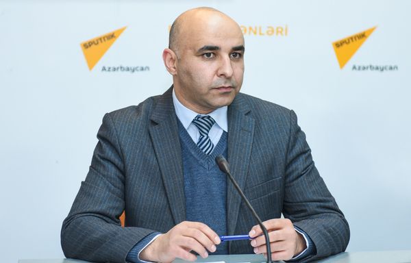Политологи Заур Мамедов и Заур Ибрагимли подвели политические итоги уходящего года в мультимедийном пресс-центре Sputnik Азербайджан - Sputnik Азербайджан