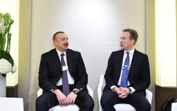 Президент Азербайджана Ильхам Алиев и президентом Всемирного экономического форума Берге Бренде во время встречи. Давос, 22 января 2018 года - Sputnik Азербайджан