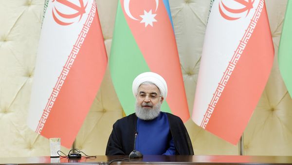 Президент Хасан Роухани в ходе выступления глав Азербайджана и Ирана с заявлениями для печати - Sputnik Азербайджан