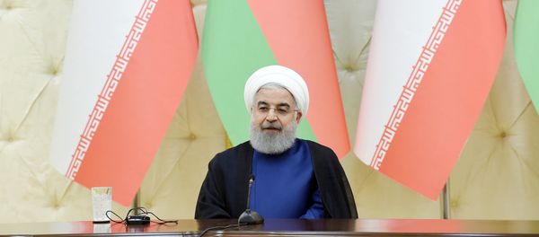 Президент Хасан Роухани в ходе выступления глав Азербайджана и Ирана с заявлениями для печати - Sputnik Азербайджан