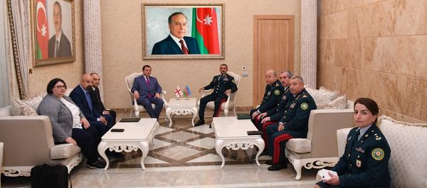 Встреча главы ГПС Эльчина Гулиева и начальника Пограничной полиции Грузии Теймураза Кекелидзе - Sputnik Азербайджан