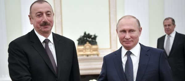 Президент РФ Владимир Путин и президент Азербайджана Ильхам Алиев во время встречи - Sputnik Азербайджан