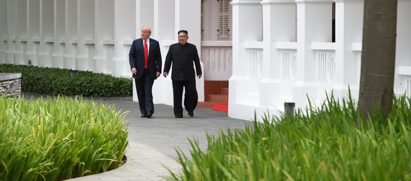 Встреча Дональда Трампа и Ким Чен Ына в Сингапуре, 12 июня 2018 года - Sputnik Азербайджан