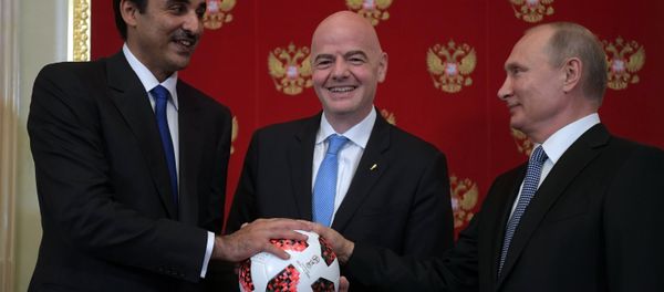 Президент РФ В. Путин принял участие в церемонии передачи Катару полномочий на проведение ЧМ-2022 по футболу - Sputnik Азербайджан