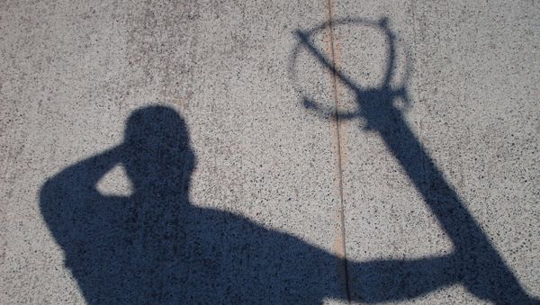 Тень мужчины, фото из архива - Sputnik Азербайджан