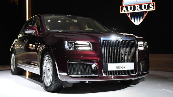 Презентация автомобиля Aurus Senat на Московском международном автомобильном салоне 2018 - Sputnik Азербайджан