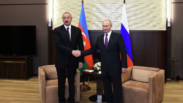 Президенты Азербайджана и РФ Ильхам Алиев и Владимир Путин во время встречи. Сочи, резиденция Бочаров Ручей, 1 сентября 2018 года  - Sputnik Азербайджан