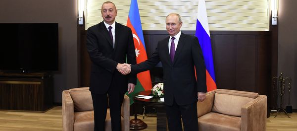 Президенты Азербайджана и РФ Ильхам Алиев и Владимир Путин во время встречи. Сочи, резиденция Бочаров Ручей, 1 сентября 2018 года  - Sputnik Азербайджан