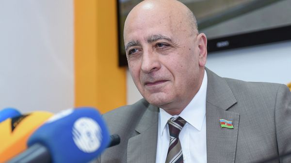 Депутат Милли Меджлиса (парламента) Азербайджанской Республики Расим Мусабеков - Sputnik Азербайджан