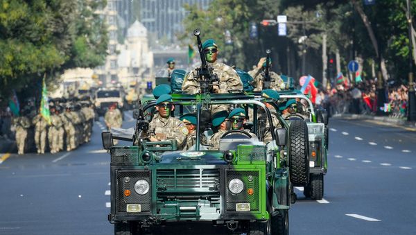 Военный парад по случаю 100-летия освобождения Баку Кавказской исламской армией. 15 сентября 2018 года - Sputnik Азербайджан