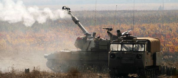 Израильские военные во время учений на границе с Сирией  - Sputnik Азербайджан