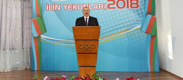 Президент Азербайджана Ильхам Алиев на церемонии в Национальном Олимпийском комитете, посвященной спортивным итогам 2018 года - Sputnik Азербайджан