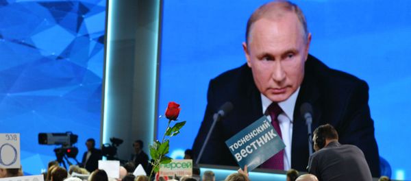 Ежегодная большая пресс-конференция президента РФ Владимира Путина в Центре международной торговли на Красной Пресне - Sputnik Азербайджан