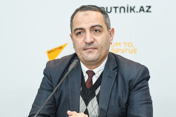 Председатель Общественного объединения Изучение экономических ресурсов Руслан Атакишиев - Sputnik Азербайджан