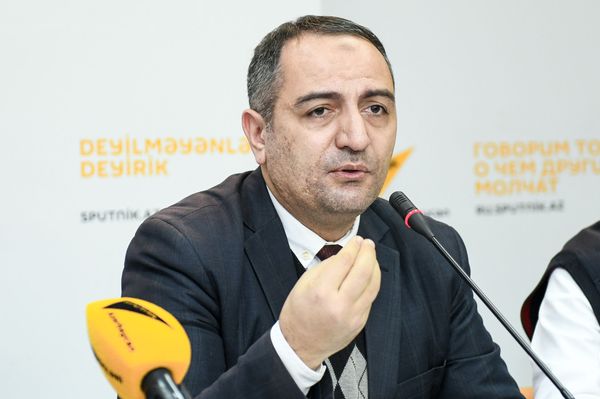 Председатель Общественного объединения Изучение экономических ресурсов Руслан Атакишиев - Sputnik Азербайджан