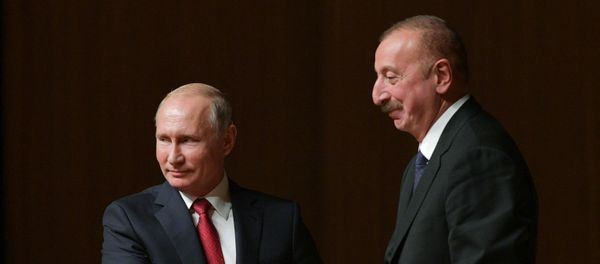 Президент РФ Владимир Путин и президент Азербайджана Ильхам Алиев во время встречи - Sputnik Азербайджан
