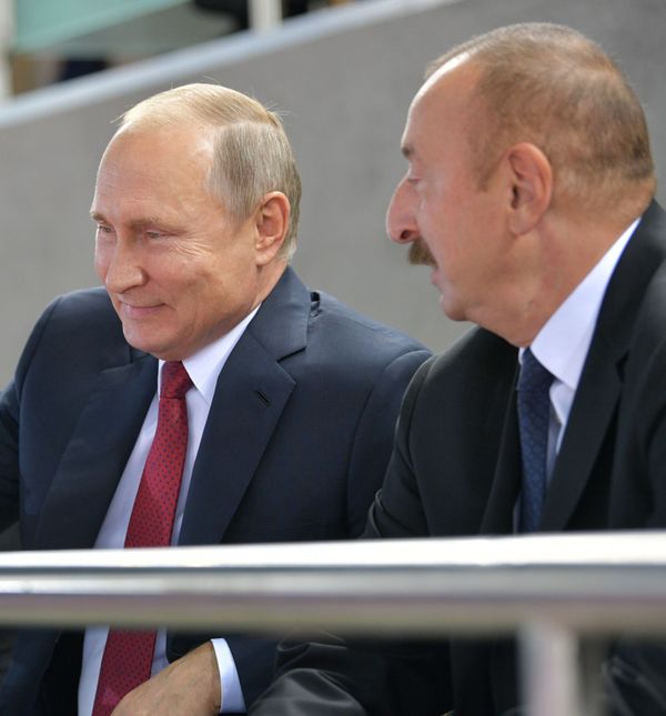 Президент РФ Владимир Путин во время посещения соревнований 32-го чемпионата мира по дзюдо в Баку с президентом Азербайджана Ильхамом Алиевым - Sputnik Азербайджан