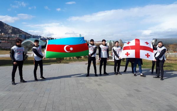 В Тбилиси прошла информационная акция в связи с Ходжалинским геноцидом - Sputnik Азербайджан