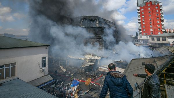 Пожар в торговом центре Диглас - Sputnik Азербайджан