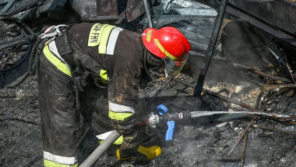 Пожар в торговом центре Диглас - Sputnik Азербайджан