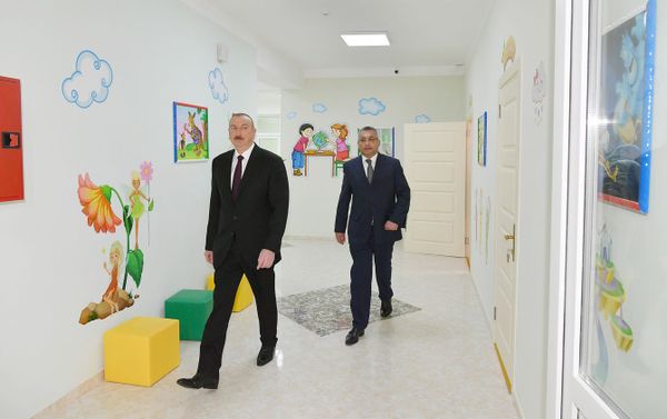 В поселке Кюрдаханы Баку состоялось открытие нового жилого комплекса для семей вынужденных переселенцев - Sputnik Азербайджан