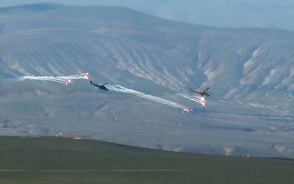 Проведены летно-тактические занятия вертолетных подразделений ВВС - Sputnik Азербайджан