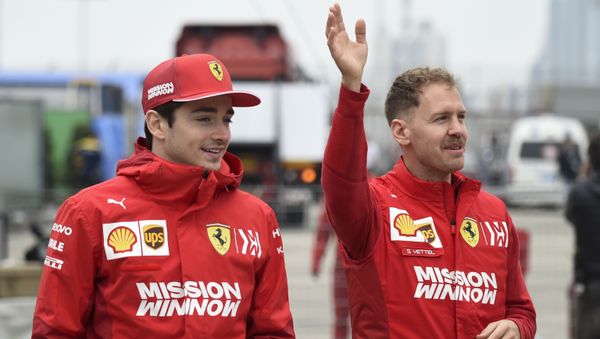 Гонщики Ferrari Себастьян Феттель и Шарль Леклер - Sputnik Азербайджан