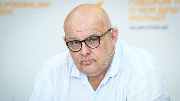 Руководитель учебных программ Международного информационного агентства Россия сегодня Олег Щедров - Sputnik Азербайджан