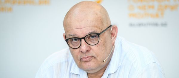Руководитель учебных программ Международного информационного агентства Россия сегодня Олег Щедров - Sputnik Азербайджан