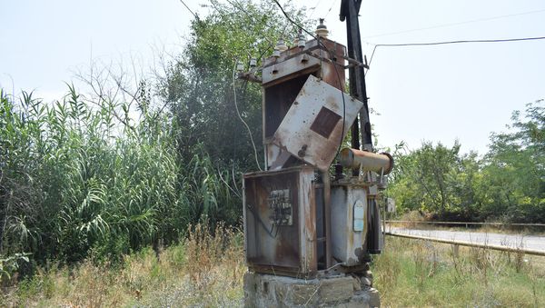 Bərdə rayonu Qaradəmirçi kəndində qəzalı vəziyyətdə olan elektrik transformatoru - Sputnik Азербайджан