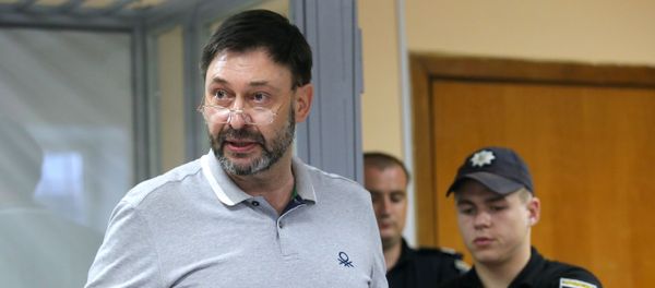 Руководитель портала РИА Новости Украина Кирилл Вышинский на заседании Подольского районного суда Киева - Sputnik Азербайджан