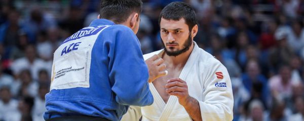 Азербайджанский дзюдоист Зелим Коцоев потерпел поражение от россиянина Казбека Занкишиева - Sputnik Азербайджан