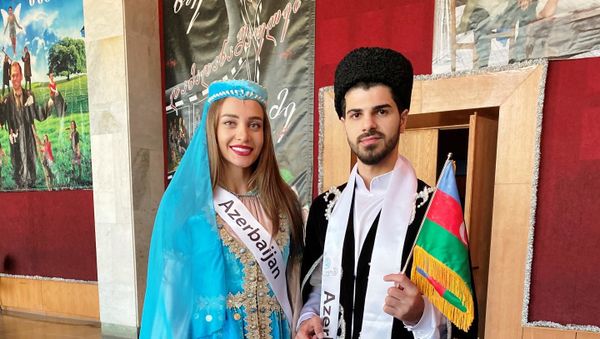 Победители конкурса красоты Miss&Mister Planet of Azerbaijan 2019 Нигяр Гасанзаде и Сирадж Бейализаде принимают участие в мировом финале Miss&Mister Planet of the World 2019, который проходит в Тбилиси  - Sputnik Азербайджан