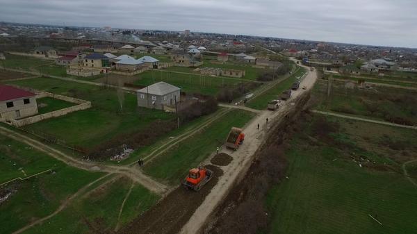 Восемь населенных пунктов на севере Азербайджана соединила асфальтовая дорога - Sputnik Азербайджан