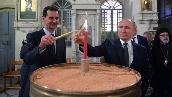 Президент России Владимир Путин и президент Сирии Башар Асад в кафедральном соборе Пресвятой Богородицы в Дамаске - Sputnik Азербайджан