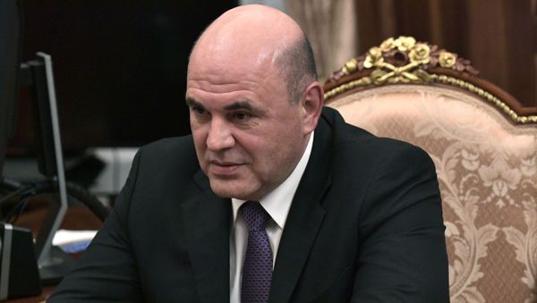 Руководитель Федеральной налоговой службы РФ Михаил Мишустин во время встречи с президентом РФ Владимиром Путиным - Sputnik Азербайджан