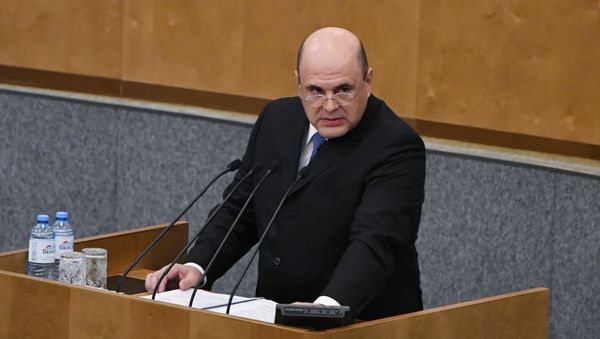Кандидат на пост премьер-министра РФ Михаил Мишустин выступает на пленарном заседании Государственной Думы РФ - Sputnik Азербайджан