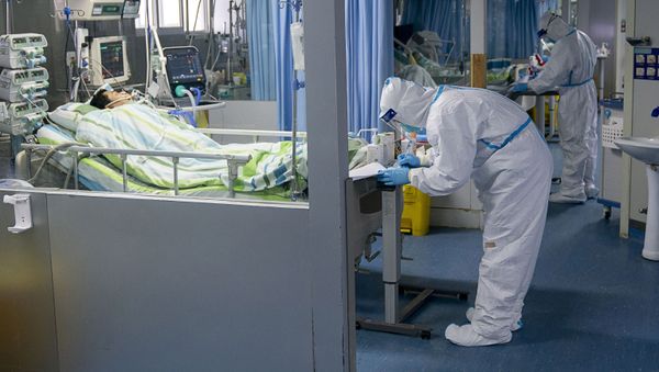  Ухань, ситуация в связи с эпидемиологической обстановкой в Китае - Sputnik Азербайджан