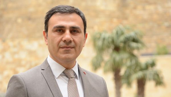 Azərbaycan Dövlət İqtisad Universitetinin Maliyyə və mühasibat fakültəsinin dekanı Gəray Musayev - Sputnik Азербайджан