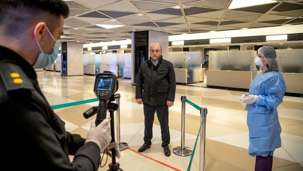 Ситуация в связи с эпидемиологической обстановкой в Бакинском аэропорту - Sputnik Азербайджан