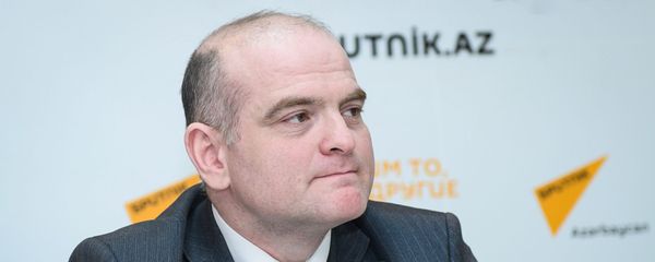 Заместитель директора Русской школы экономики UNEC Эльшад Мамедов - Sputnik Азербайджан