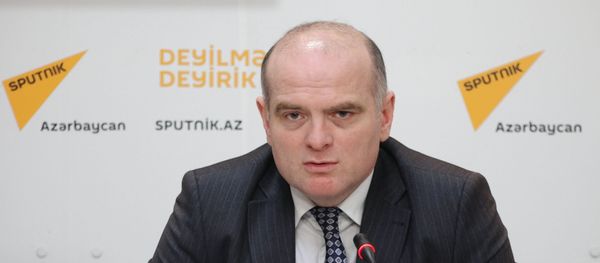 Сюрпризов до конца года не будет: спекуляция вокруг девальвации необоснованна - Sputnik Азербайджан