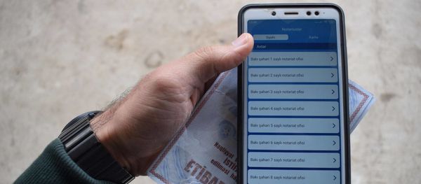 Мобильный нотариус, фото из архива Мобильный нотариус, фото из архива - Sputnik Азербайджан