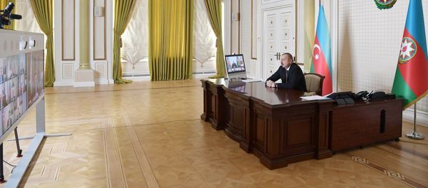Ильхам Алиев во время видеоконференции, фото из архива - Sputnik Азербайджан